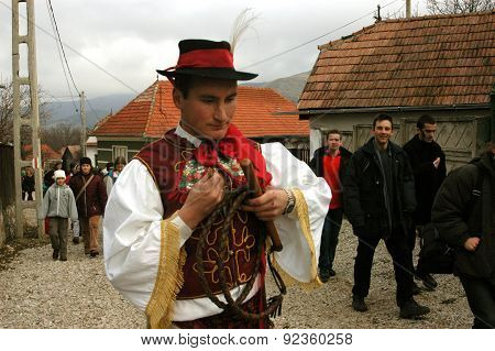 People In Traditional Costumes Celebrating The Winter Carnival