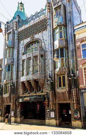 AMSTERDAM, NETHERLANDS - MAY 5, 2013: It's an architectural landmark of the city - a building Theater Tuschinski presenting an eclectic mix of different styles (Amsterdam School Jugendstil Art Nouveau and Art Deco).
