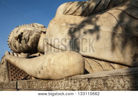Buddha image at Wat Phra That Luang landmark of Lao PDR in Vientiane