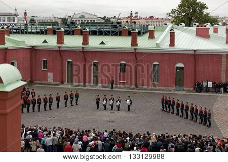 ST. PETERSBURG, RUSSIA - MAY 28, 2016: People watching honor guard ceremony in St. Peter and Paul fortress. The ceremony was held since the foundation of fortress till 1926, and re-established in 2008