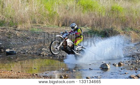 Vladivostok, Russia - may 1, 2014: cars, motorcycles, ktm Enduro and ATV, go off-roading in five-day race Russian rally 2014