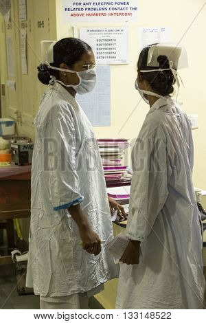Documentary Editorial. Pondicherry Jipmer hospital India - June 1 2014. Full documentary about patient and their family. While children are hospitalized Families waiting eating outdoor