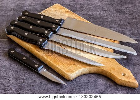 Knives set of 7 subjects against a dark background