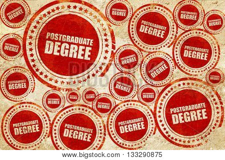 postgraduate degree, red stamp on a grunge paper texture