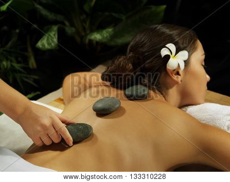 portrait of young beautiful woman in spa environment