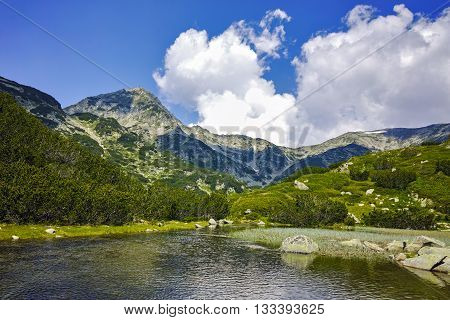 Amazing view of Muratov peak and mountain river in Pirin Mountain, Bulgaria