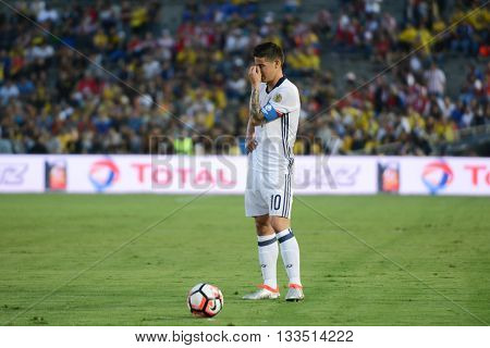 James Rodriguez With Your Hand In The Face Before Kicking The Ball