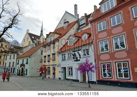 RIGA LATVIA - MARCH 10: Houses in the Old Town of Riga on March 10 2015 in Riga Latvia. Old Town is the most popular touristic place in Riga.