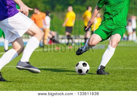 football soccer game. competition between two running players