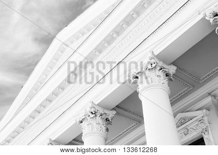 Courthouse facade with columns. Vintage style filter