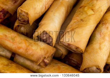 Stack of freshly cooked popia or chinese spring rolls