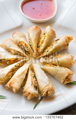 Vietnamese fried springroll served with chili sauce