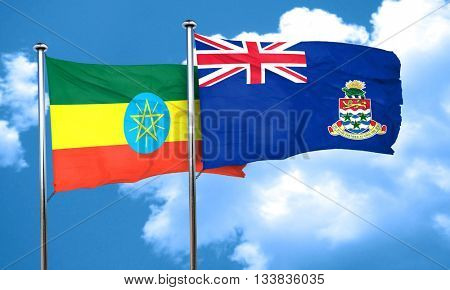 Ethiopia flag with Cayman islands flag, 3D rendering 