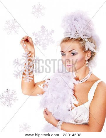 若い美しい女性持株スノーフレーク。スタジオ撮影をファッションします。