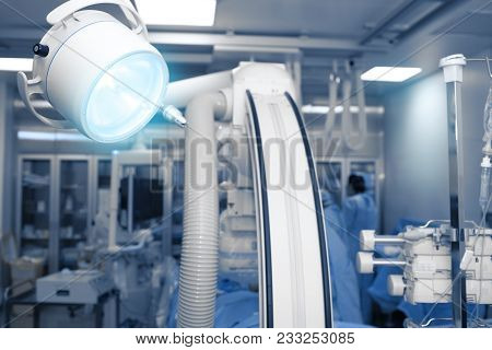 Working Medical Team In The Interventional Surgery Room.