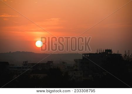 Photo Of Sunset In The Indian Village Puttaparthi
