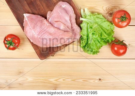 Freshvegetables And Dietary Meat On Wooden Background. Healthy Natural Food On Table With Copy Space
