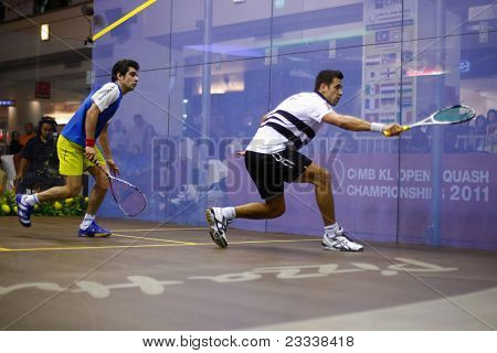 KUALA LUMPUR, MALAYSIA - MARCH 18: Azlan Iskandar, Malaysia (white) plays Aamir Atlas (Pakistan) in the quarterfinals of the CIMB KL Open Championship 2011. March 18, 2011 in Kuala Lumpur, Malaysia.