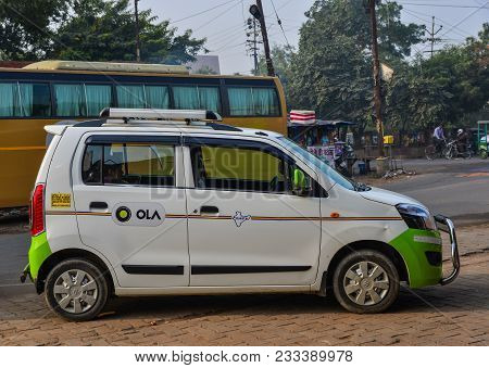 Agra, India - Nov 12, 2017. Ola Car On Street In Agra, India. Agra Is Included On The Golden Triangl