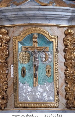 POKUPSKO, CROATIA - NOVEMBER 24: Door of Tabernacle on the main altar in the Church of Assumption of the Virgin Mary in Pokupsko, Croatia, on November 24, 2016.
