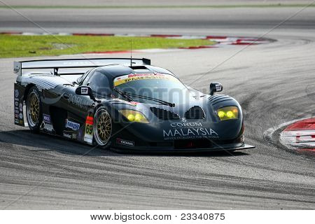 SEPANG - 18 juni: The Mosler MT900M auto van ThunderAsia Racing zet in een praktijk ronden in de Sepa