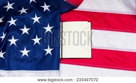 Red Blue Flag Of Unired States Of America With Note On It.