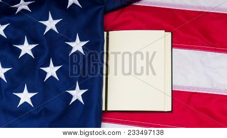 Red Blue Flag Of Unired States Of America With Note On It.