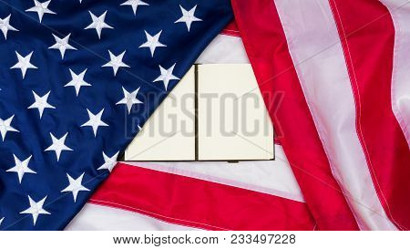 Red Blue Flag Of Unired States Of America With Note On It.