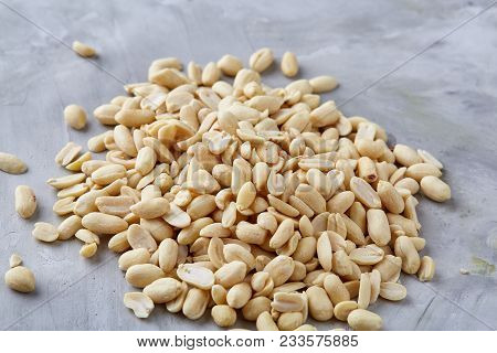 Pile Of Peelled Peanuts Isolated On White Textured Background, Background, Top View, Close-up, Selec