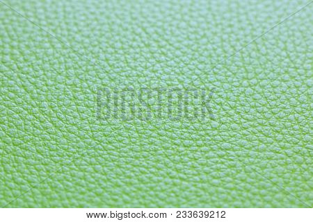 Green Leather Texture Closeup. Useful As A Background For Design Work.