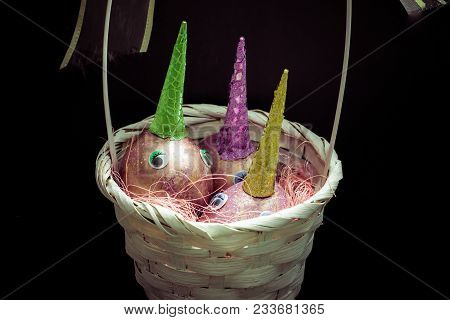Easter Unicorns Cosmic Purple Eggs With Eyes And Colorful Sparkling Horns In White Straw Basket With