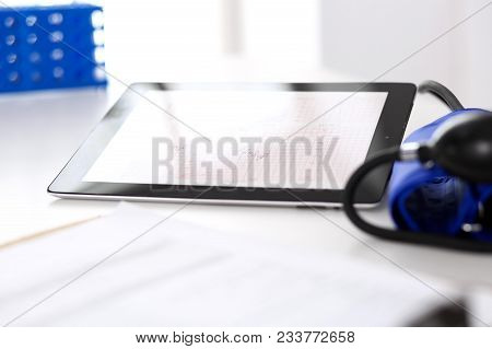Workplace Of Doctor. Tablet Ps Showing Heart Diagrams Closeup. Healthcare And  Cardiology In Medicin