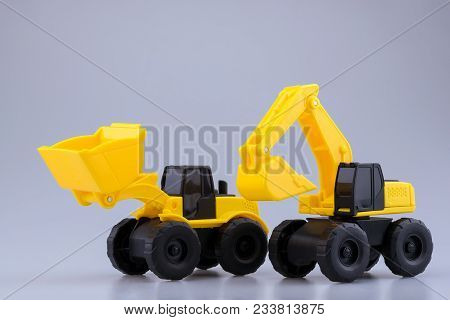 Heavy Duty Construction Backhoe Toy Isolated With Clipping Path On White Background.