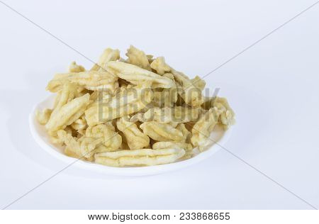 Spicy Indian Chickpea Snack (ganthiya Or Gathiya) On A White Background