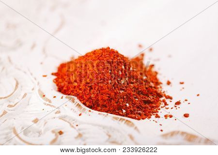 Aleppo Pepper mild chilli flakes in small bowl