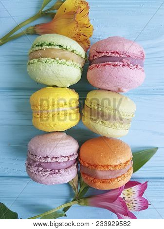 Makaroon On Blue Wooden Flower Alstroemeria Bakery