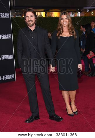 LOS ANGELES - NOV 04:  Christian Bale and Sibi Blazic arrives for the ÃFord v FerrariÃ Screening on November 04, 2019 in Hollywood, CA                