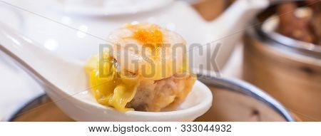 Siu Mai, One Of Dim Sum Yum Cha, Pork And Shrimp Steamed Dumplings On Restaurant House White Backgro
