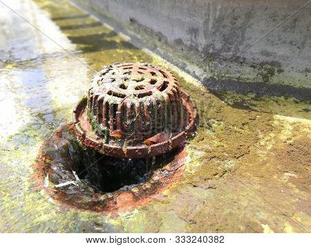 Old Metal Head Roof Drain Cleaning Rain Water Drainage Pipe System For Roof Deck.
