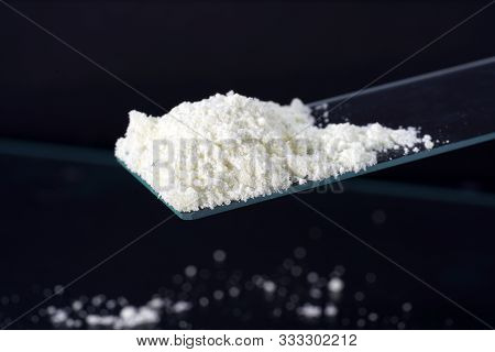 Potassium hexacyanoferrate is used in chemistry lessons to grow red, monoclinic crystals.