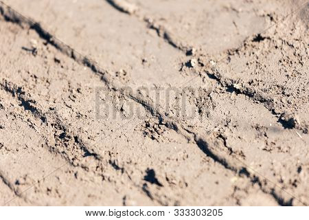 Selective Sharpness, Background Off-road, Dirt Close. Off-piste. Impassable Road For Motocross And A