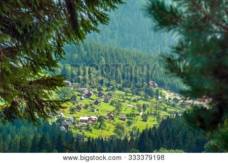 Mountain Village On A Sunny Summer Day.