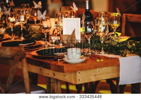 Elegant Arrangement Of The Holiday Tableware. Vintage Decoration Of Reception Dinner Table. Rustic W