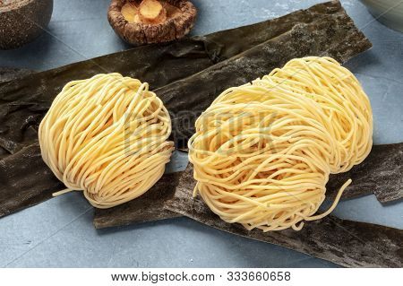Udon Noodles, Close-up With Dried Sea Vegetable Kelp And Shiitake Mushrooms, Ramen Ingredients