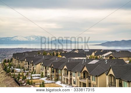 Focus On Houses With Scenic Utah Lake And Snowy Mount Timpanogos Background
