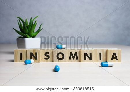 Stock Photo Insomnia Word From Wooden Blocks On Desk