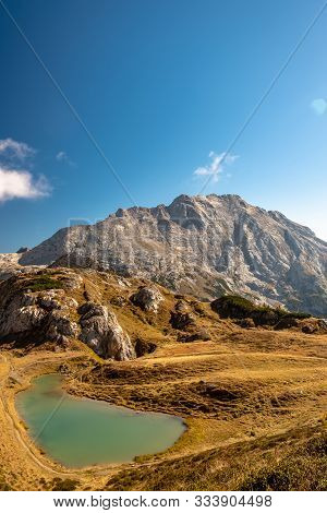 The Bordaglia Lake In A Colorful Autumn Day