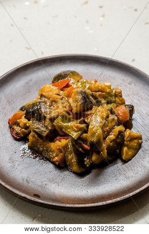 Turkish Food Saksuka With Eggplant With Tomatoes And Olive Oil. / Patlican Cigirtma.
