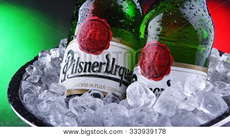 Bottles Of Pilsner Urquell Beer In Bucket With Crushed Ice