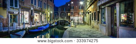 Venice, Italy - December 25, 2012. A Quiet Street In Venice Taken At Dusk In Winter. Romantic Scene 